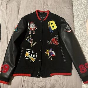 Black pyramid varsity jacket